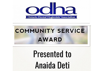 Anaida Deti is presented with ODHA community service award