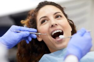 patient getting teeth cleaned